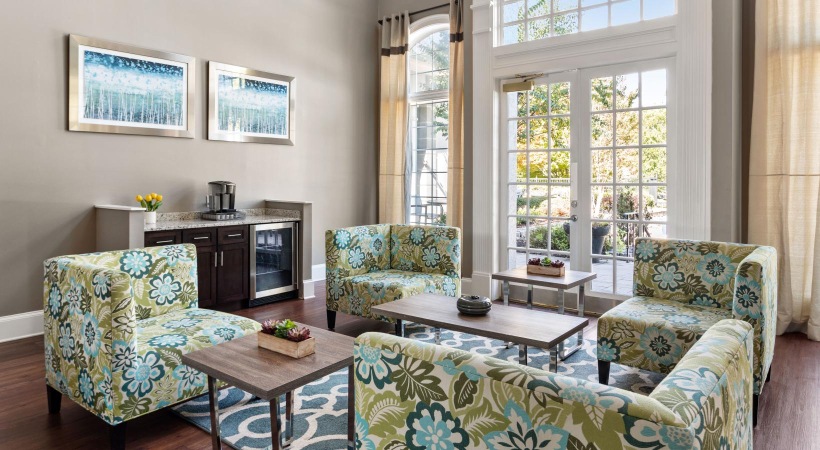 french door and large windows brighten clubhouse space